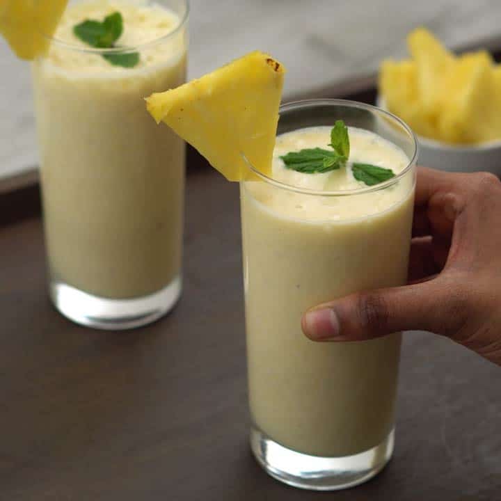 serving the pineapple smoothie