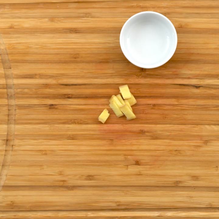 chopped ginger in cutting board