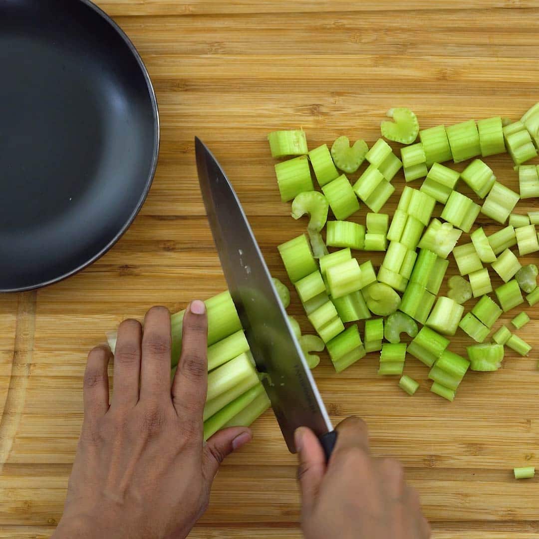 cutting the celery into small pieces