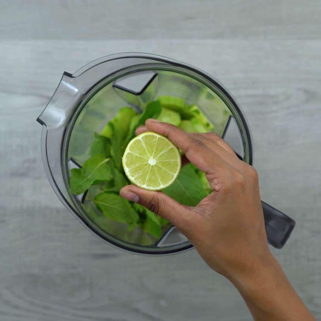 adding lime juice to cucumber and mint leaves