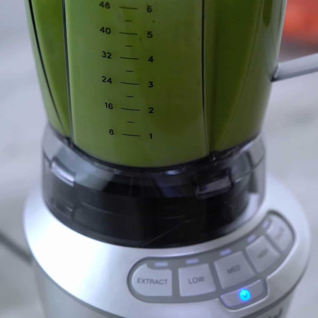 grinding all the ingredients in a blender