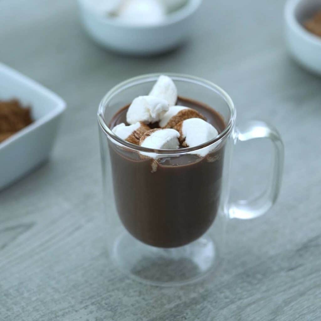 homemade hot chocolate is served with marshmallow