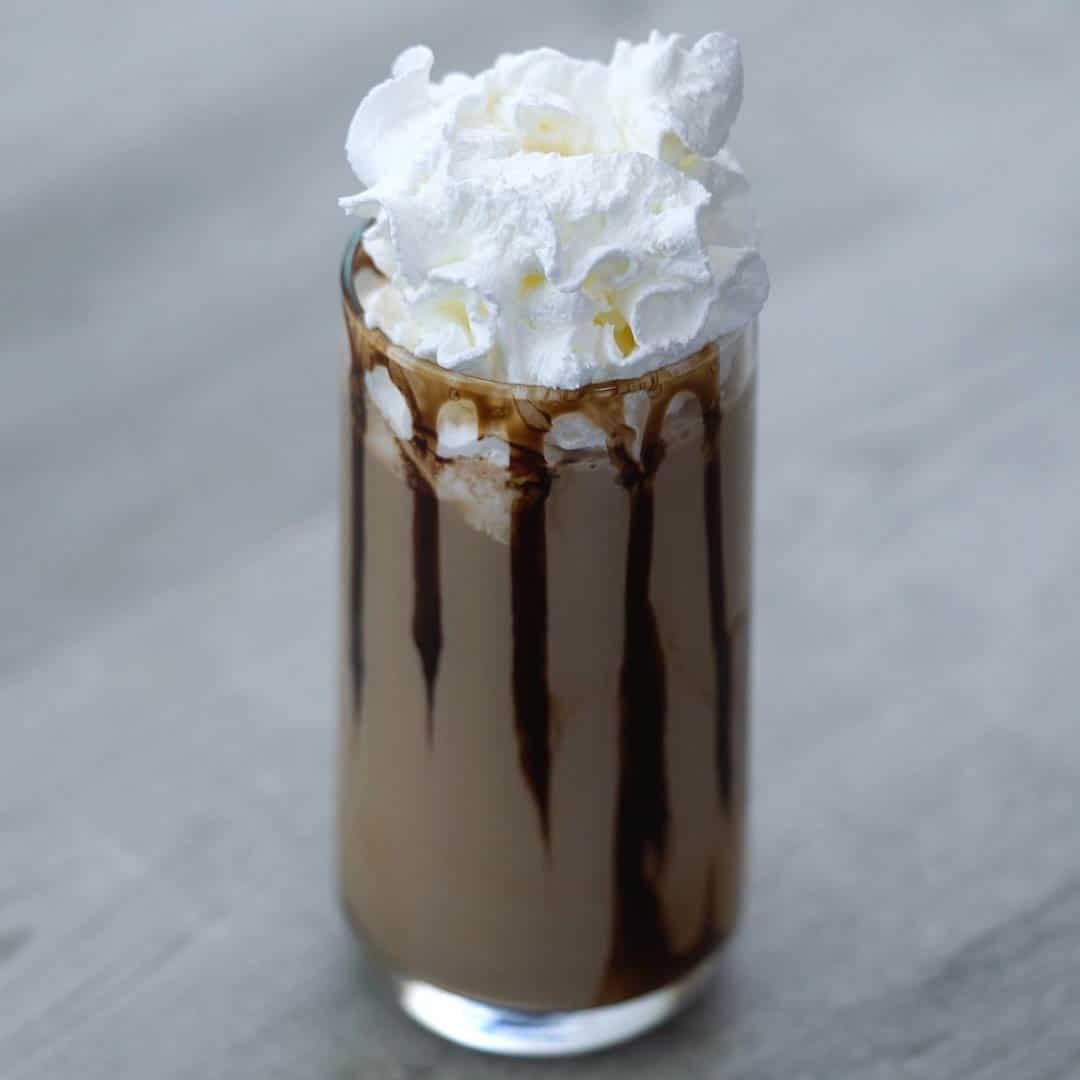 chocolate milkshake topped with whipping cream