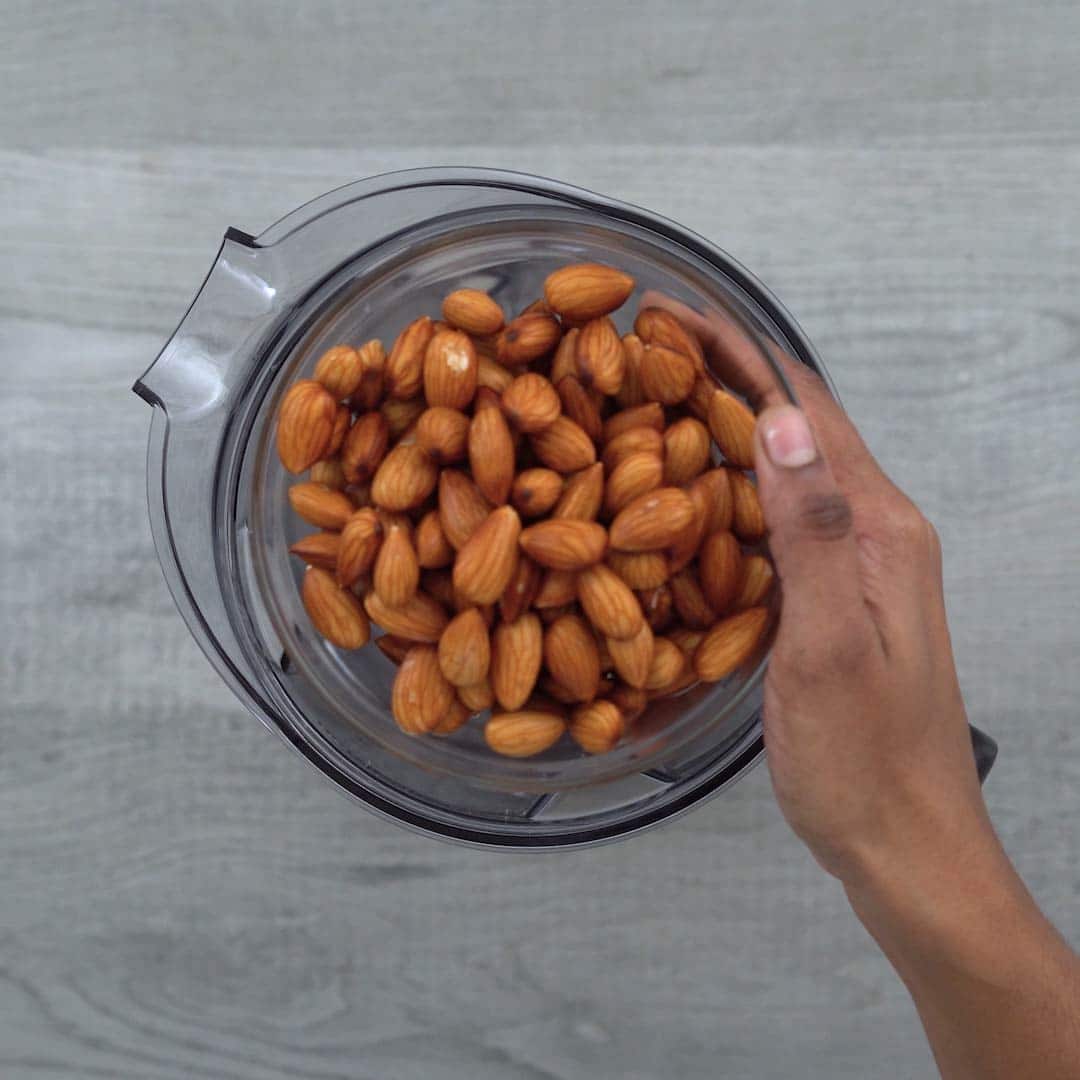 Adding soaked almonds in blender jar