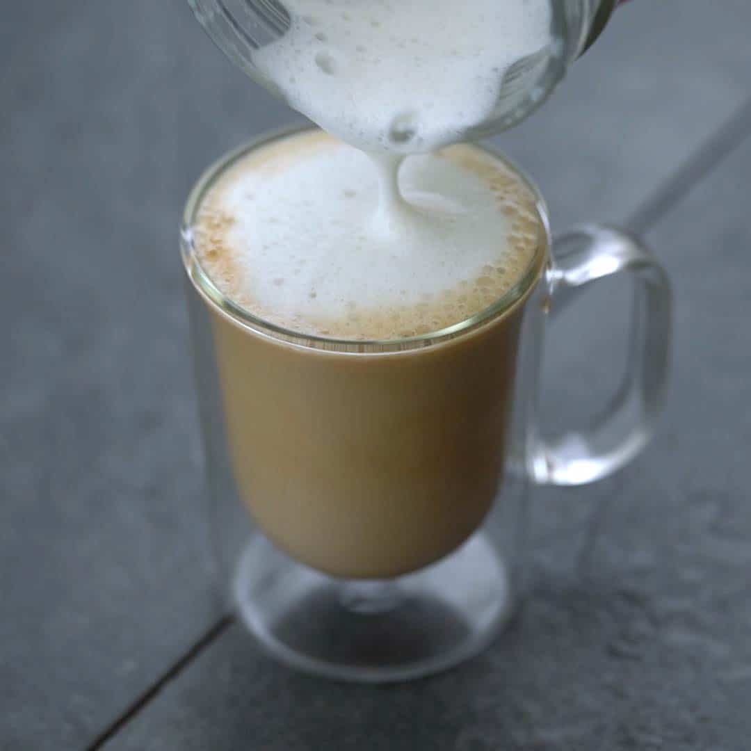 pouring frothed milk