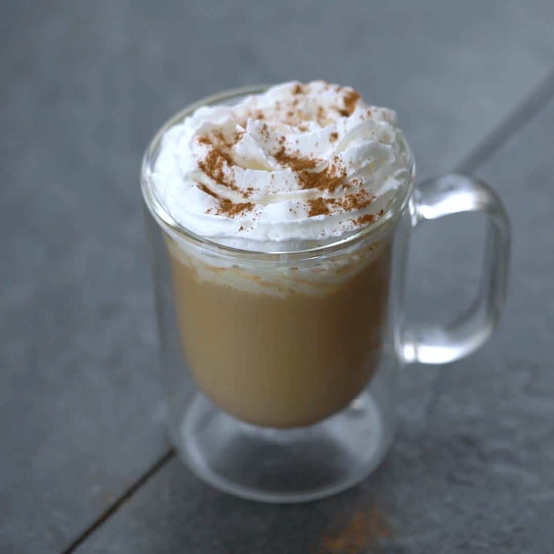 chai tea latte with whipped cream topped