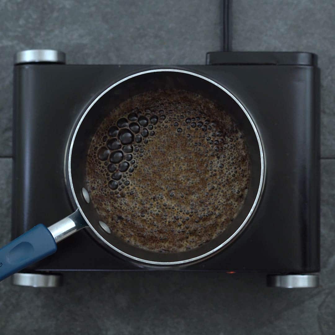 brewing black tea in a sauce pan