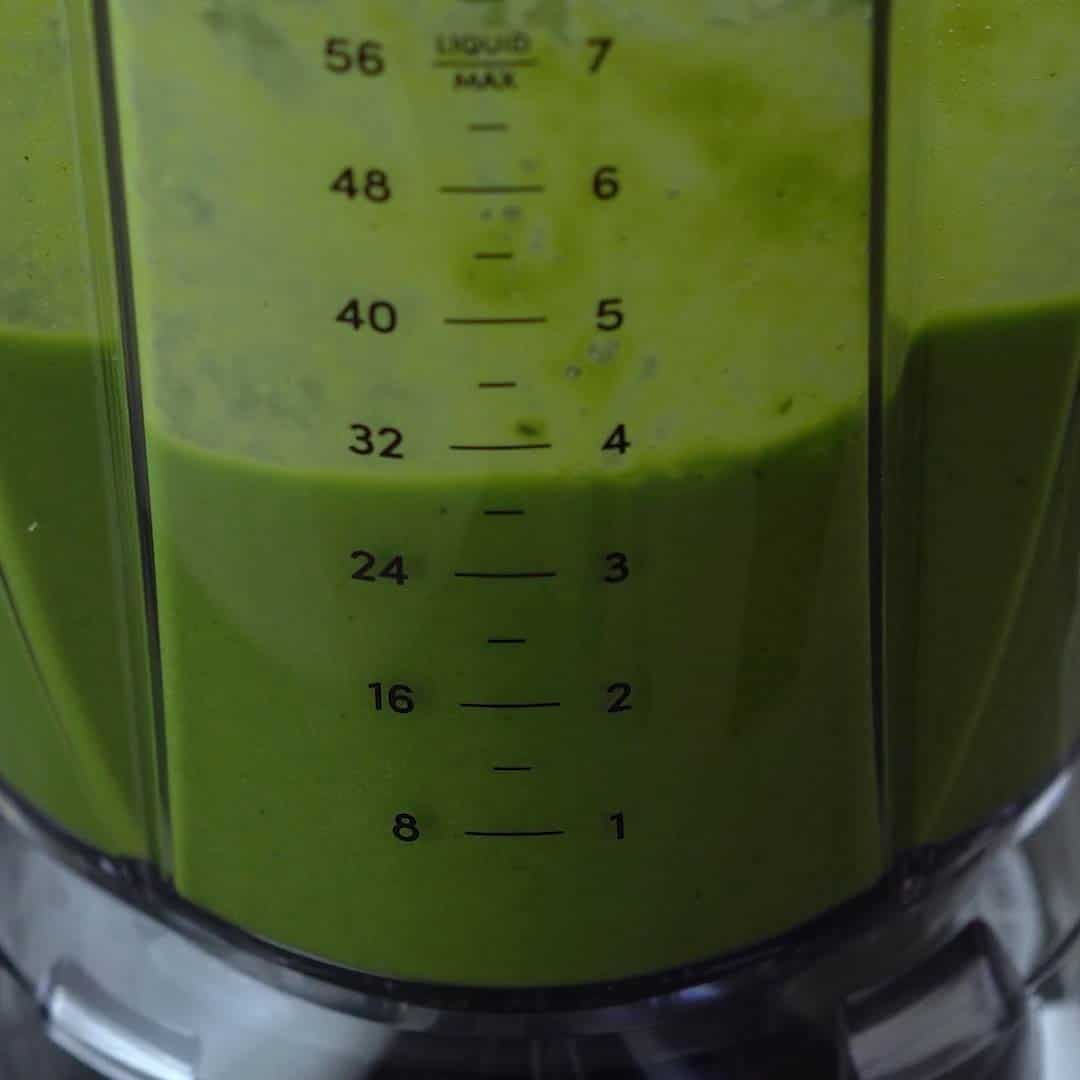 green smoothie in a blender jar