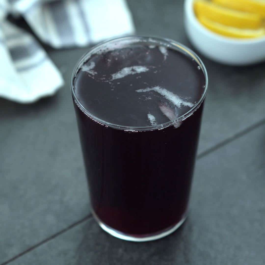 Hibiscus tea or agua de jamaica is served in a glass
