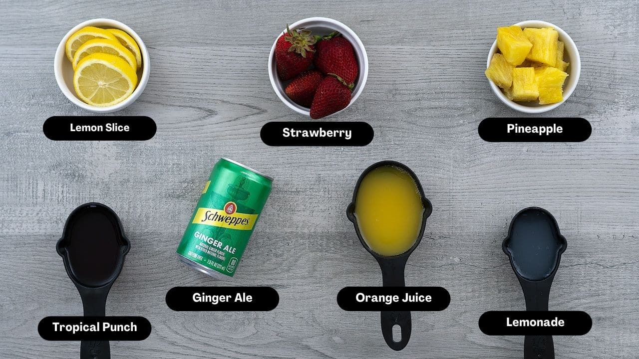 Ingredientes de ponche de frutas para fiestas sin alcohol en una mesa