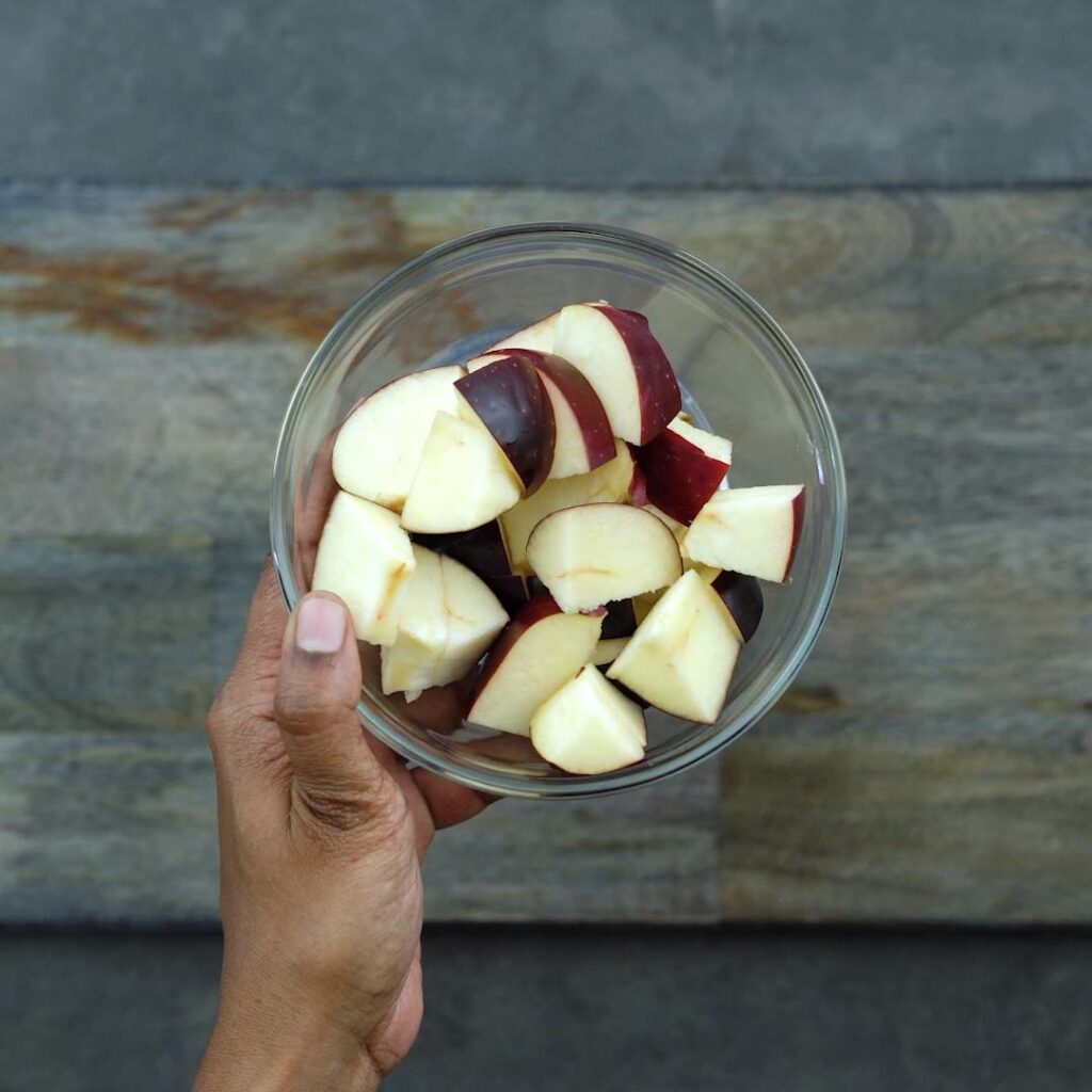 Chopped red apples in a bowl
