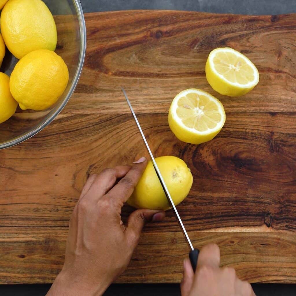 Cutting lemons in half
