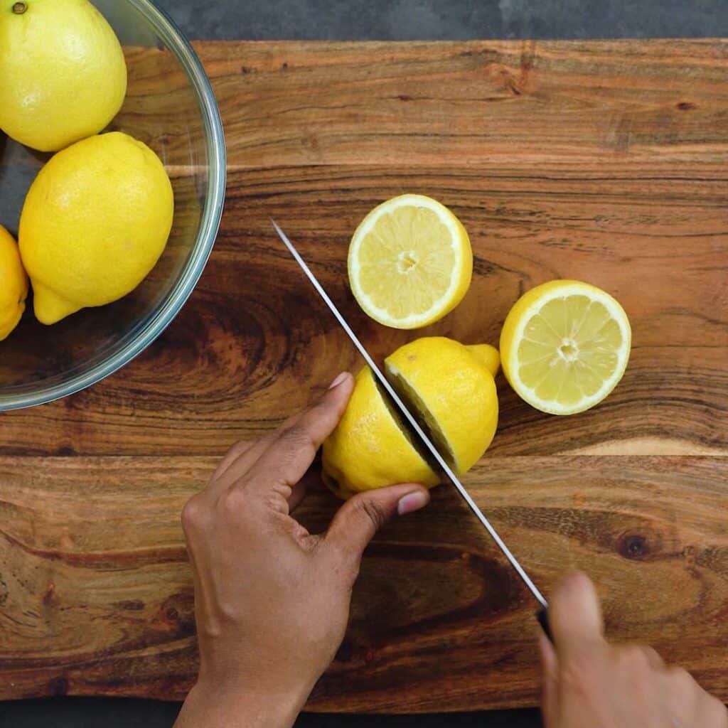 Cutting the lemons in half