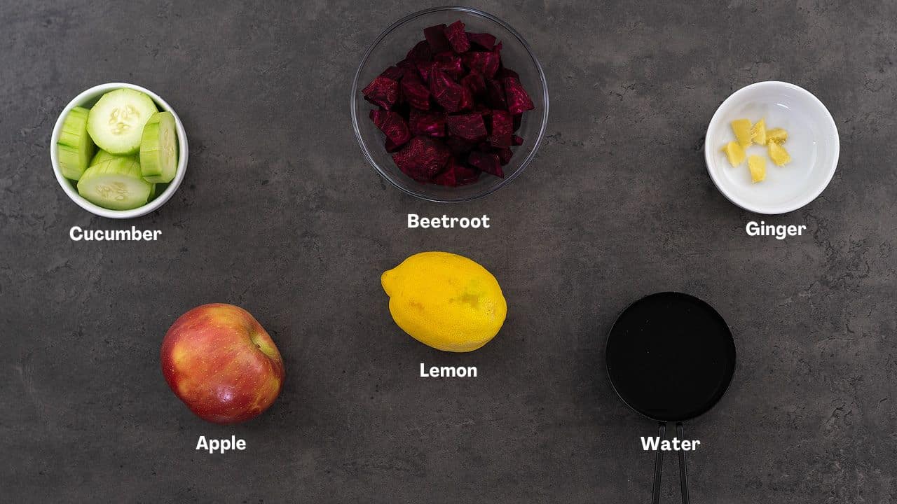 Beetroot juice recipe ingredients placed on a grey table