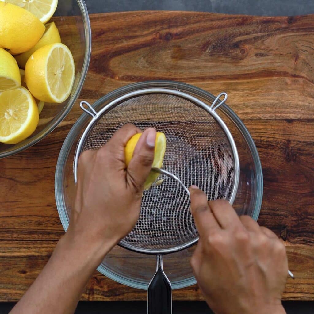 Squeezing the juice from the lemon